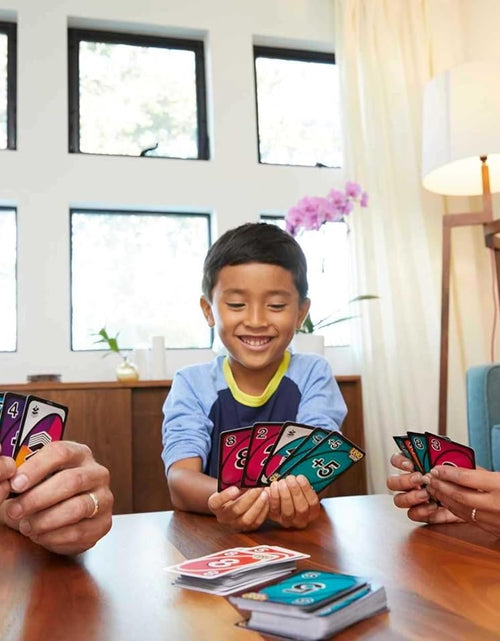 Load image into Gallery viewer, UNO FLIP! Family Card Game, with 112 Cards in a Sturdy Storage Tin, Makes a Great Toy for 7Y+ and up UNO FLIP! Family Card Game, with 112 Cards in a Sturdy Storage Tin (Amazon Exclusive)
